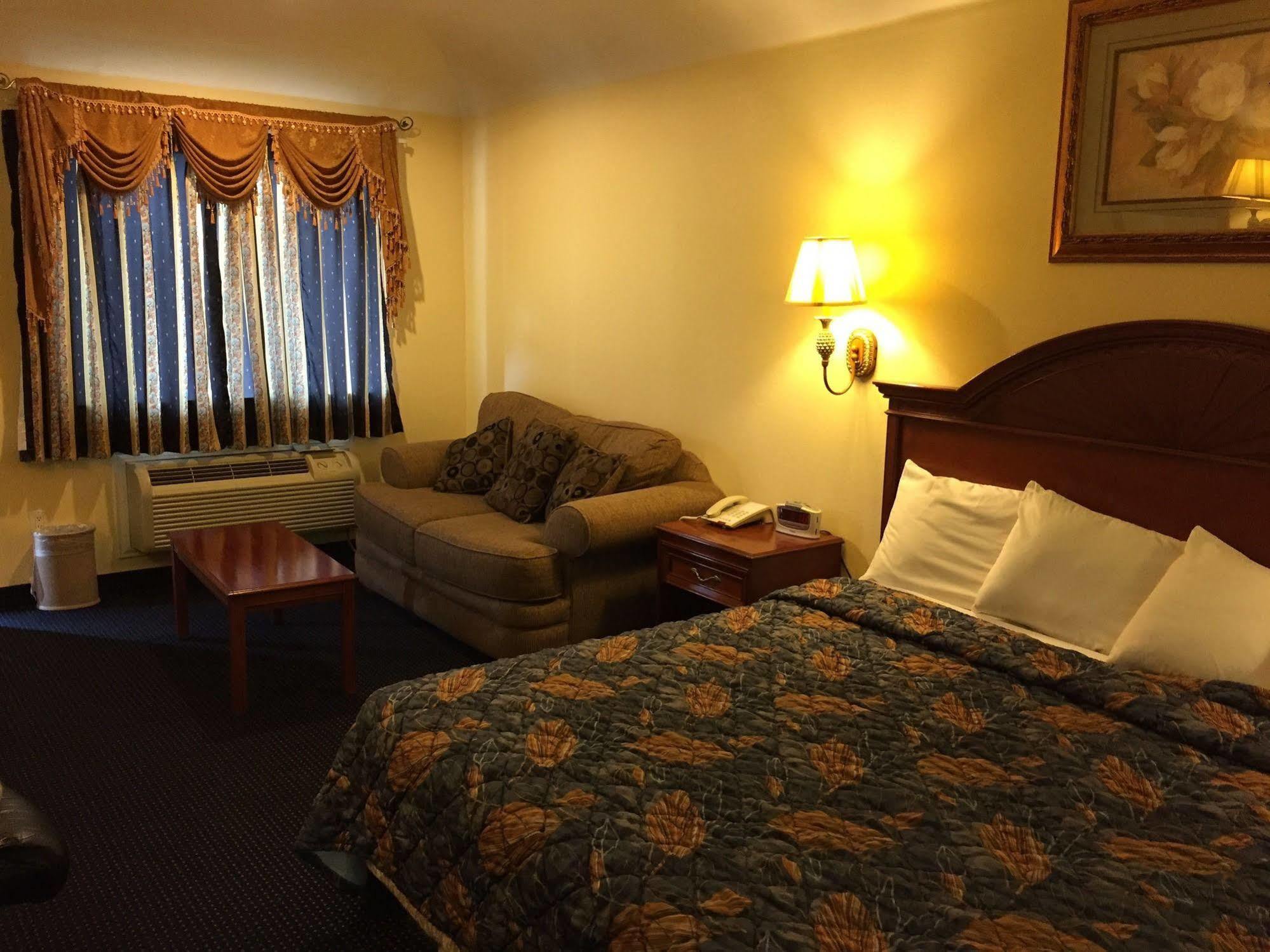 Executive Inn & Suites Shepherd Exterior foto